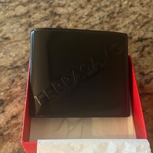 Salvatore Ferragamo Glossy Black Wallet